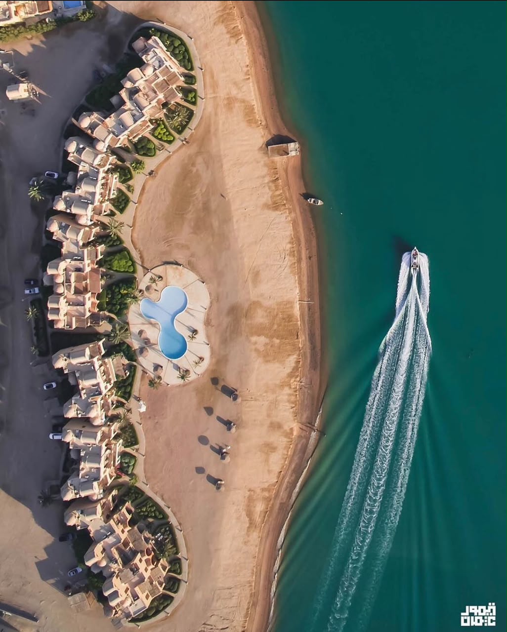 A boat beside the Red Sea coastline