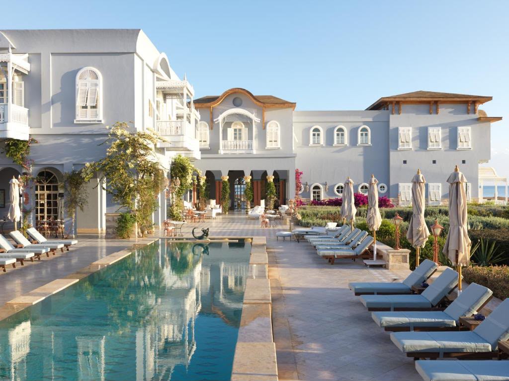 A hotel courtyard and pool